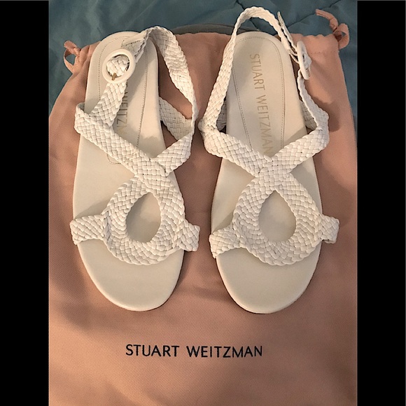 Stuart Weitzman Shoes - NWOT- Stuart Weitzman white leather sandals w/woven crisscrossed circle. Size 7